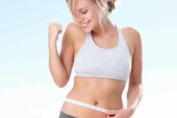 woman happy after fat reduction treatment Greater London (Ealing)