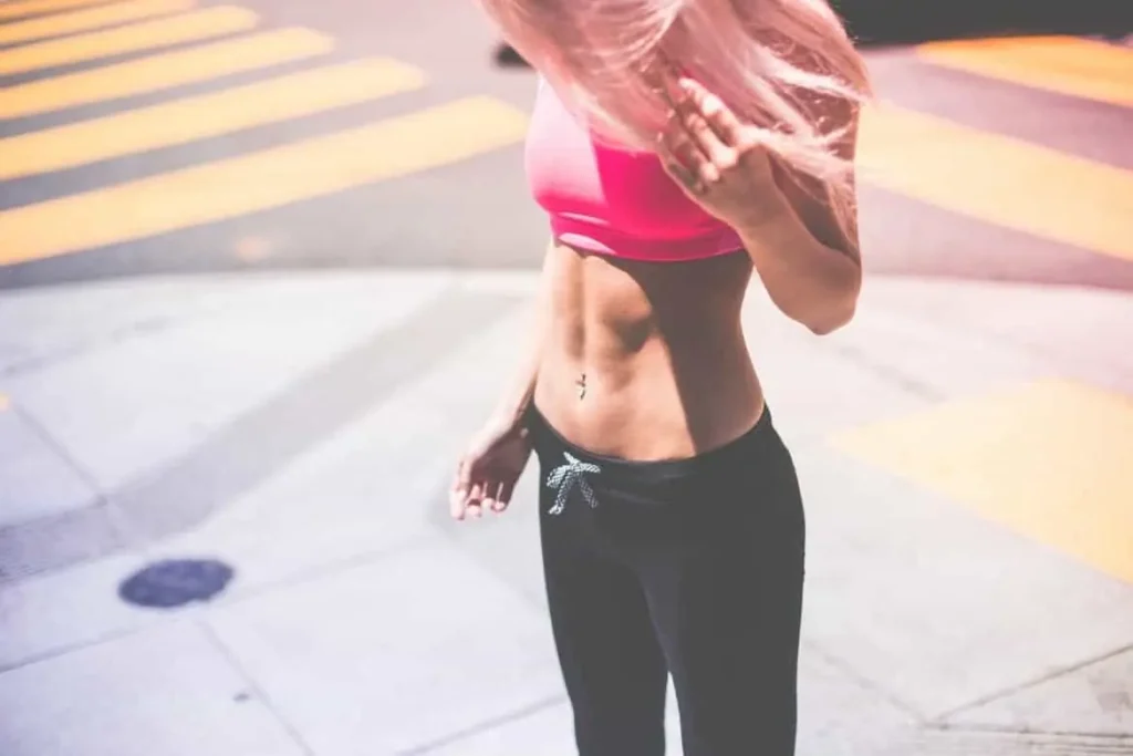 Woman with toned stomach after LA-EMS Body Sculpting Treatment Greater London (Ealing)