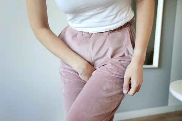 woman running for the toilet because of urinary incontinence Greater London (Ealing)